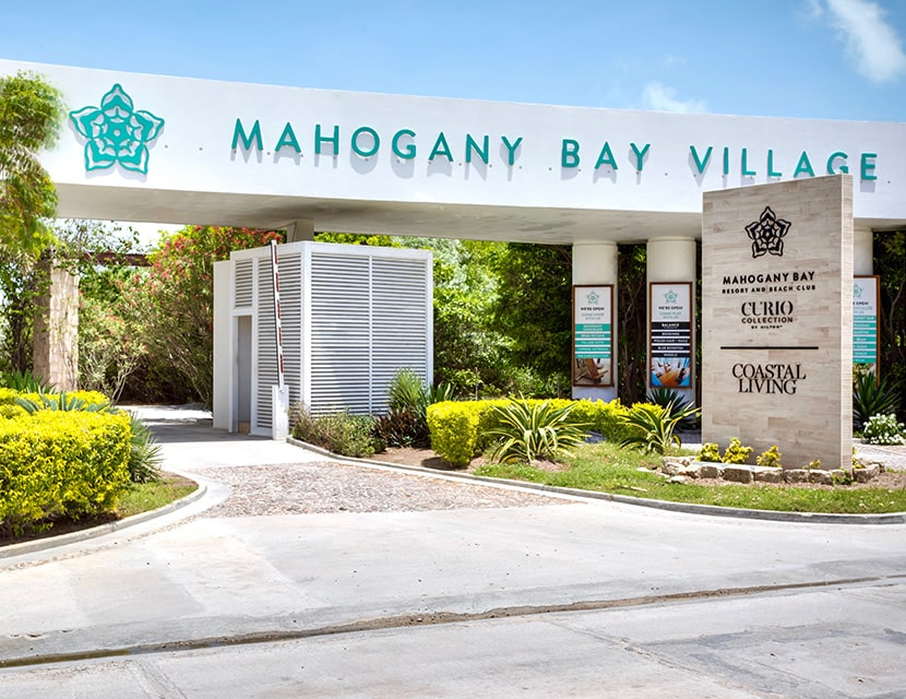 The entry gate of Mahogany Bay Resort