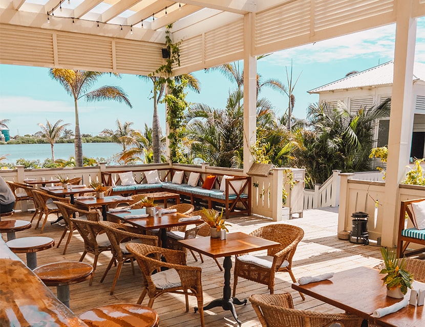 The outdoor terrace at Shaken Bar & Grill at Mahogany Bay Resort & Beach Club