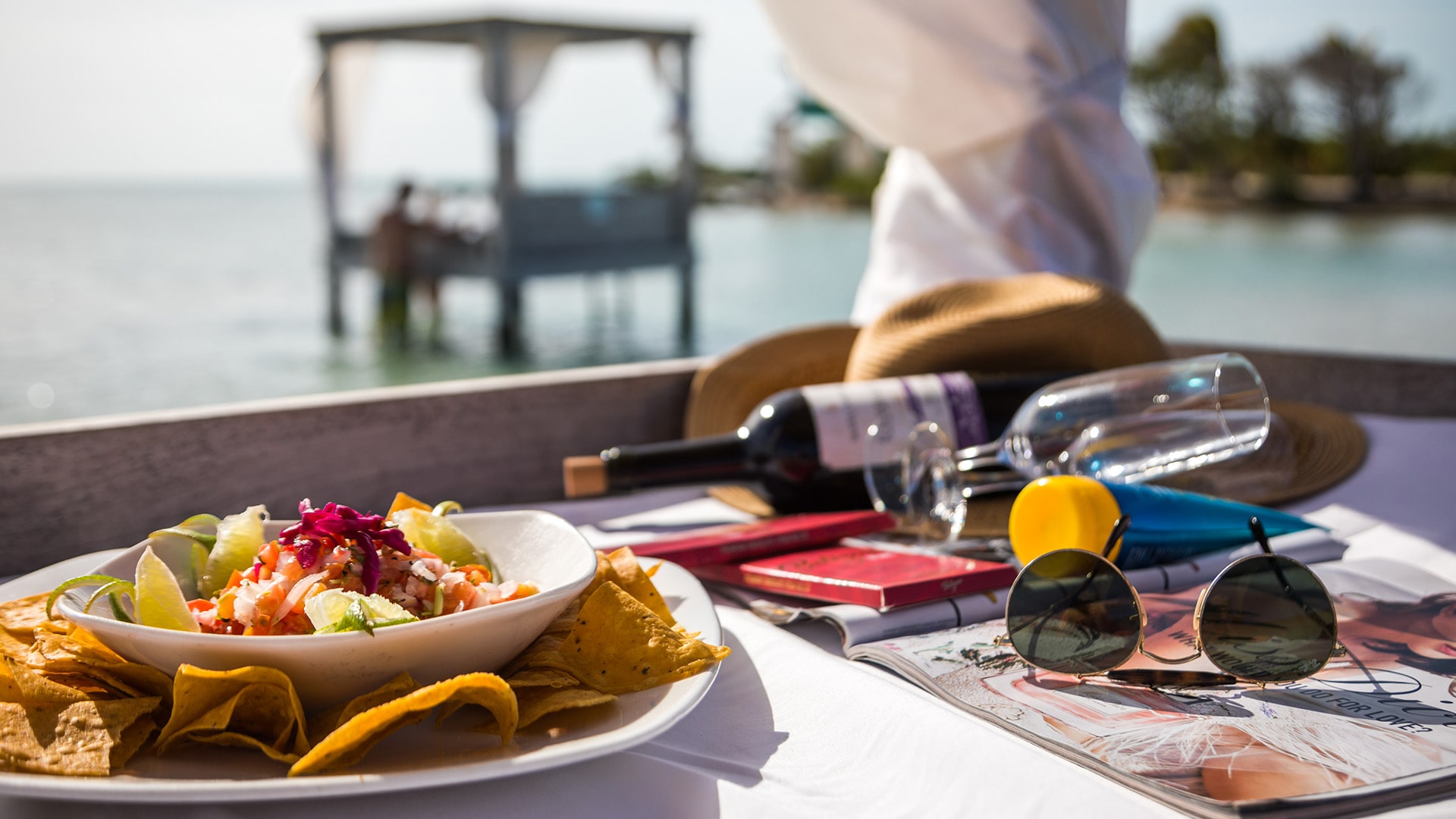 Food & Drinks in the overwater cabana at the Beach Club at Mahogany Bay Resort & Beach Club